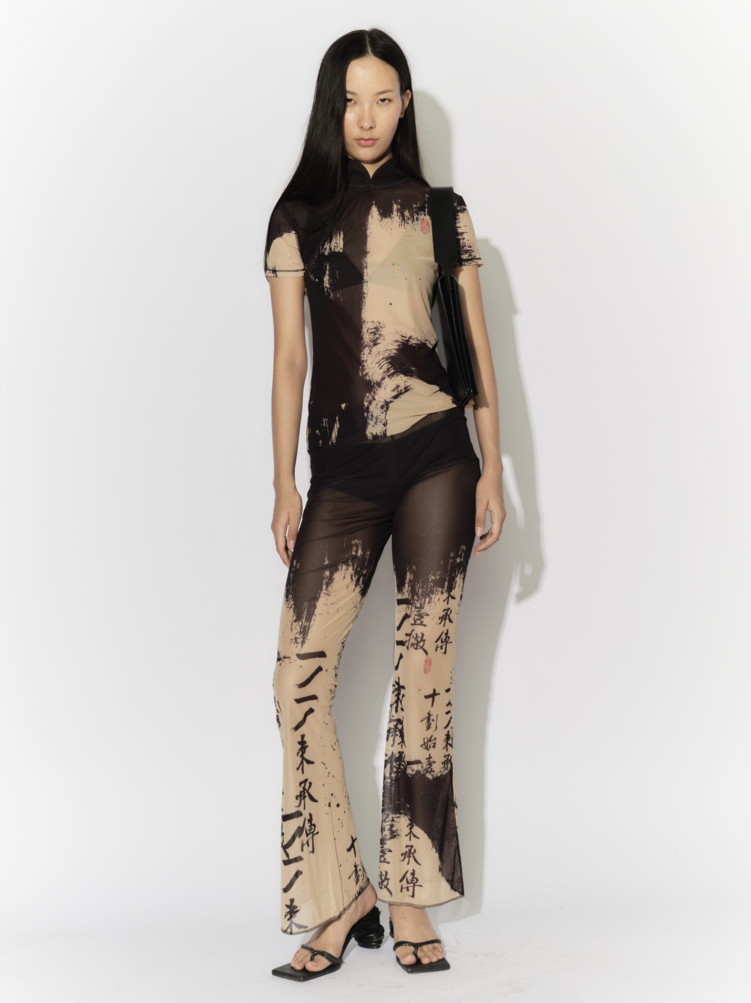 Picture of MESH CALLIGRAPHY STROKE PANTS 